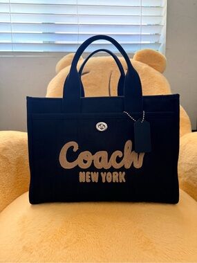 Coach Black Canvas Tote with Gold Logo Script